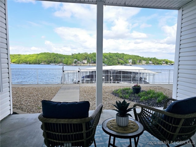 view of patio / terrace featuring a water view