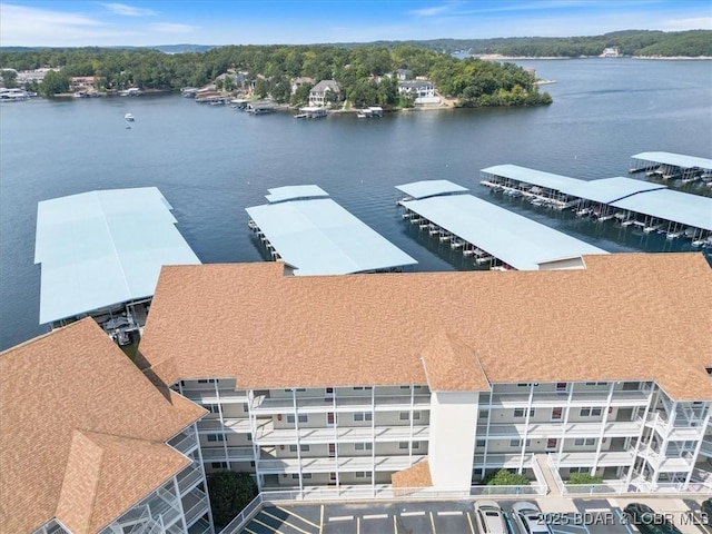 drone / aerial view featuring a water view