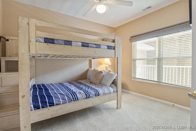 bedroom featuring ceiling fan and carpet flooring