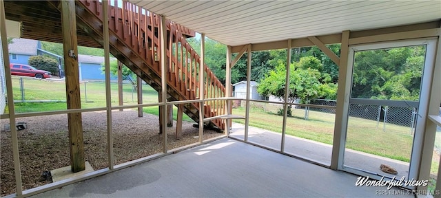 unfurnished sunroom with a wealth of natural light