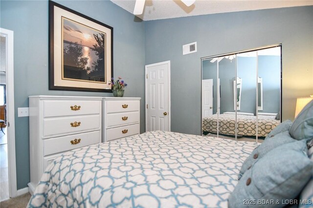 788 Kersten Way Unit A308, Osage Beach, MO 65065 - carpeted bedroom with a ceiling fan, lofted ceiling, and a closet