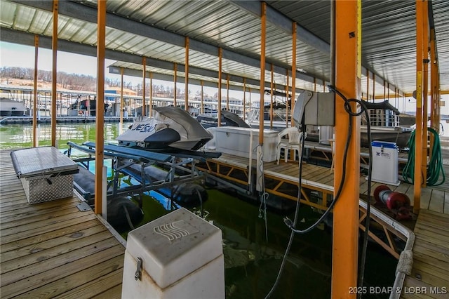 dock area featuring a water view