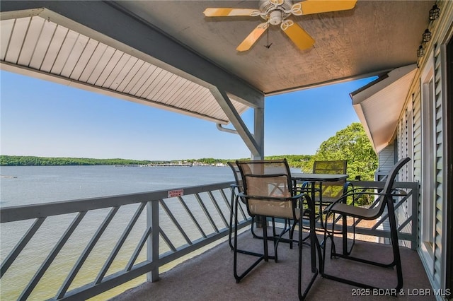 788 Kersten Way Unit A308, Osage Beach, MO 65065 - balcony with ceiling fan, a water view, and outdoor dining area