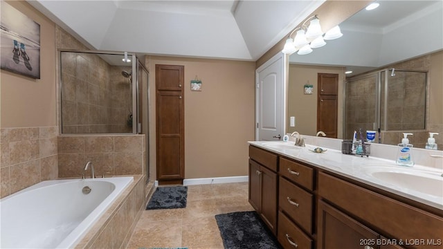 bathroom featuring vanity, tile patterned floors, independent shower and bath, and lofted ceiling