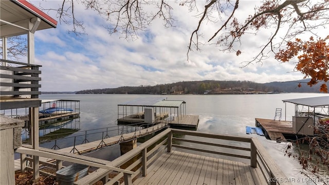 view of dock with a water view