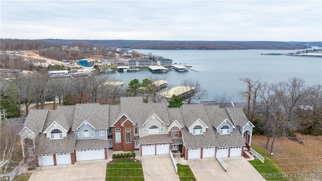 birds eye view of property featuring a water view