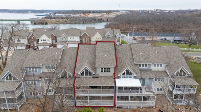 drone / aerial view featuring a water view