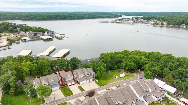 4906 Wilson Dr, Osage Beach, MO 65065 - bird's eye view with a water view, a view of trees, and a residential view
