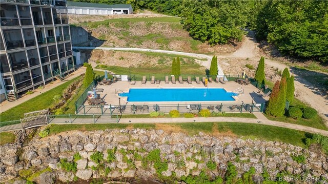 view of pool featuring a patio area