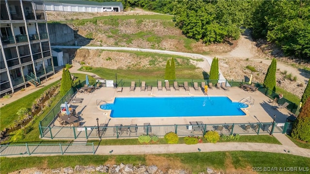 view of swimming pool with a patio area