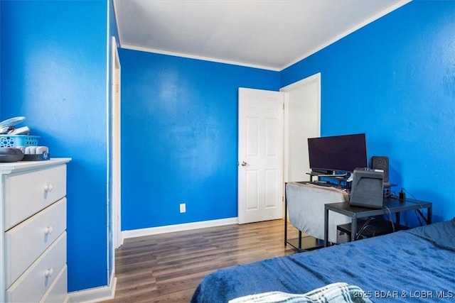 bedroom with ornamental molding and wood-type flooring