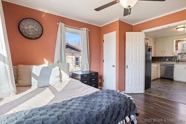 bedroom with crown molding, dark hardwood / wood-style floors, ceiling fan, and black fridge