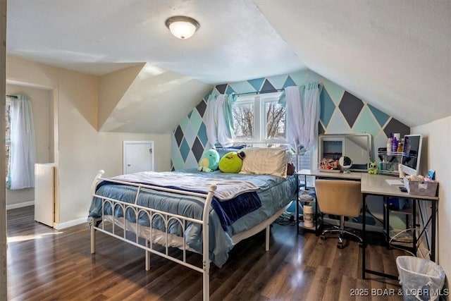 bedroom with dark hardwood / wood-style flooring and vaulted ceiling