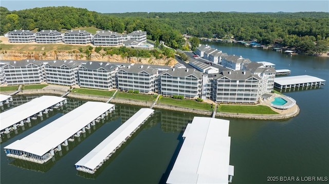 birds eye view of property featuring a water view