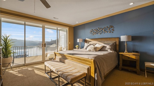 carpeted bedroom featuring ornamental molding, a water view, access to outside, and ceiling fan