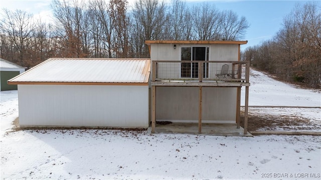 view of snow covered property