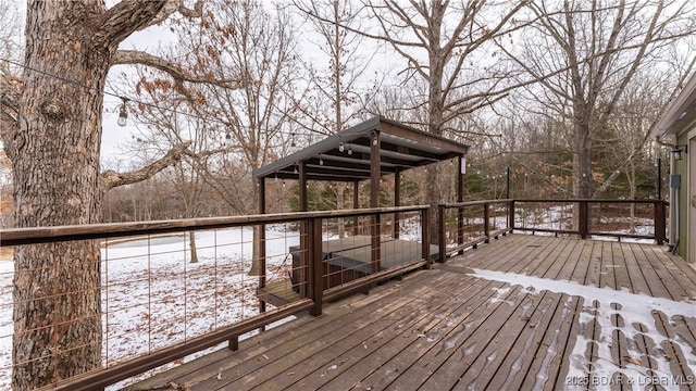 view of snow covered deck