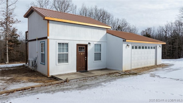 view of front of home featuring central AC unit