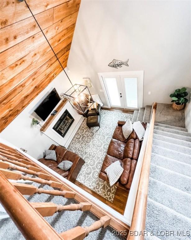 living room with a towering ceiling