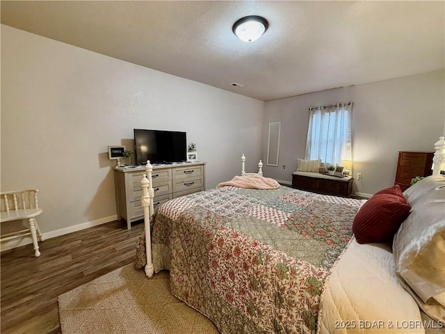 bedroom featuring hardwood / wood-style flooring