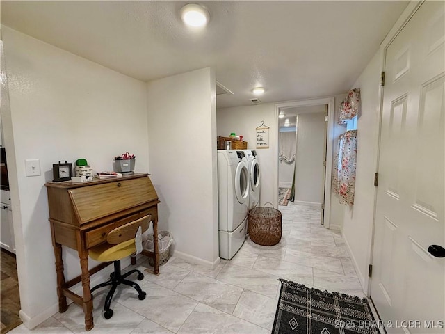 laundry room with washing machine and dryer