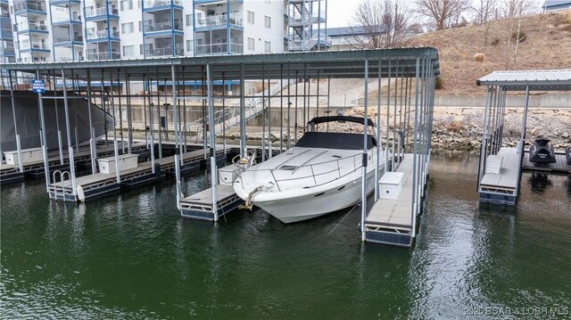 85 Monarch Cove Ct Unit 3A, Lake Ozark, MO 65049 - dock featuring a water view