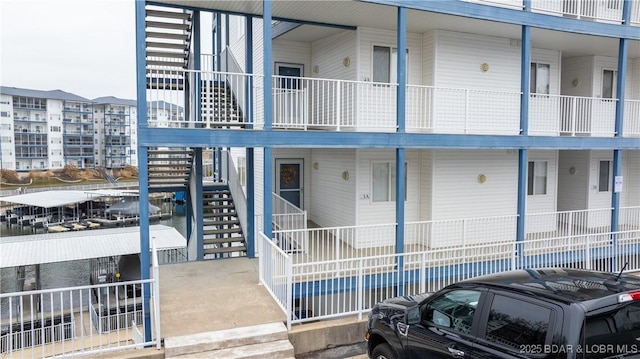 view of property featuring stairs