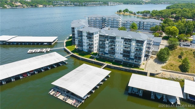 85 Monarch Cove Ct Unit 3A, Lake Ozark, MO 65049 - drone / aerial view of apartment complex / building and a nearby body of water