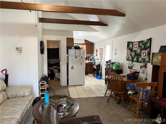 living room with light carpet and lofted ceiling with beams