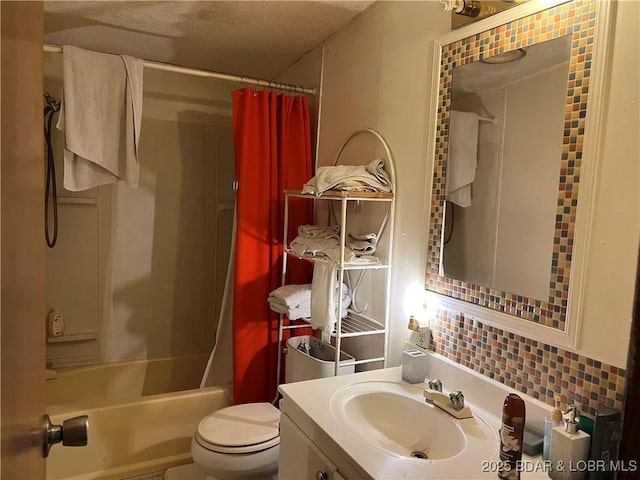 full bathroom with vanity, toilet, and shower / bath combo with shower curtain