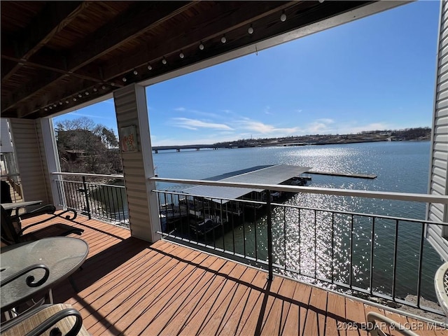 balcony featuring a water view