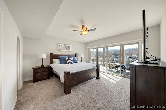 carpeted bedroom with access to outside and ceiling fan