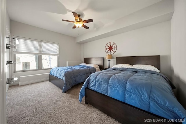 bedroom with ceiling fan and carpet flooring