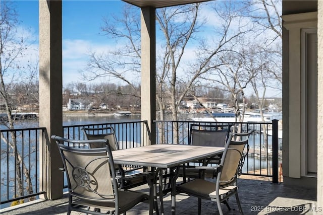 deck featuring a water view