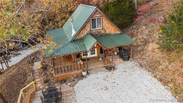 log-style house featuring a porch