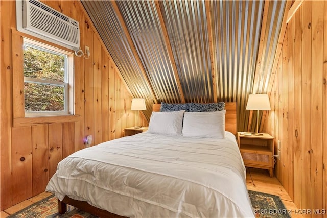 bedroom with a wall unit AC and wooden walls