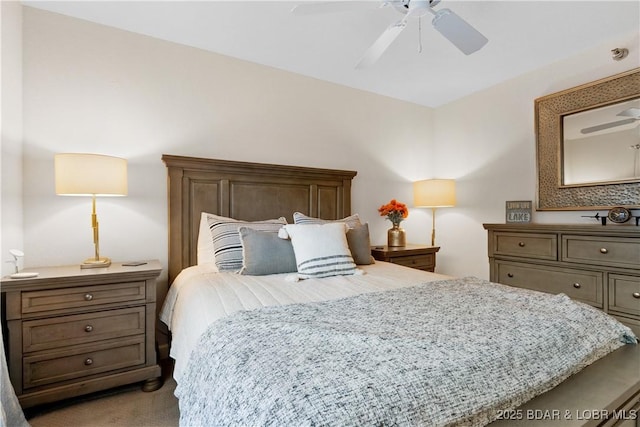 bedroom with ceiling fan and carpet flooring