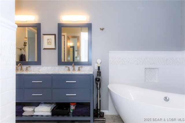 bathroom with vanity and a bathing tub