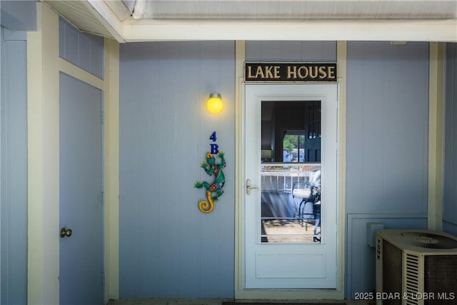 doorway to property with cooling unit