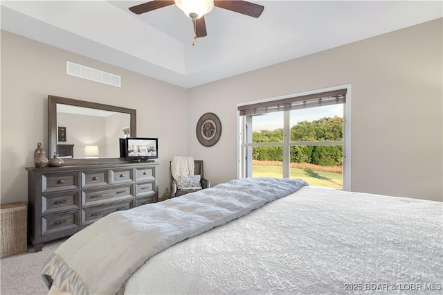 carpeted bedroom with ceiling fan