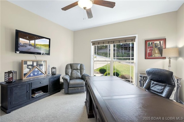 home office with carpet floors and ceiling fan