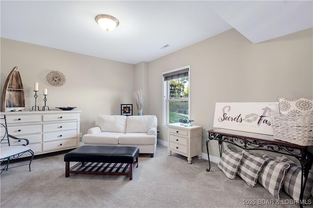 bedroom featuring light colored carpet