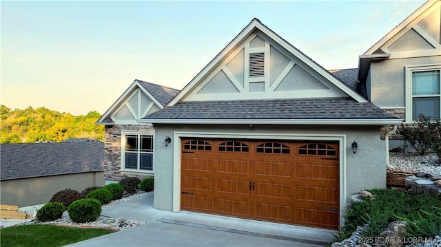 view of front of property with a garage