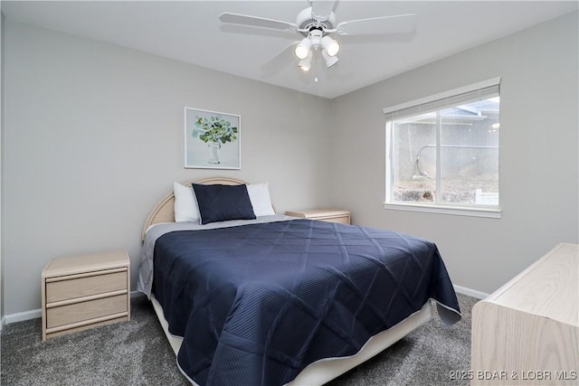 bedroom with dark carpet and ceiling fan