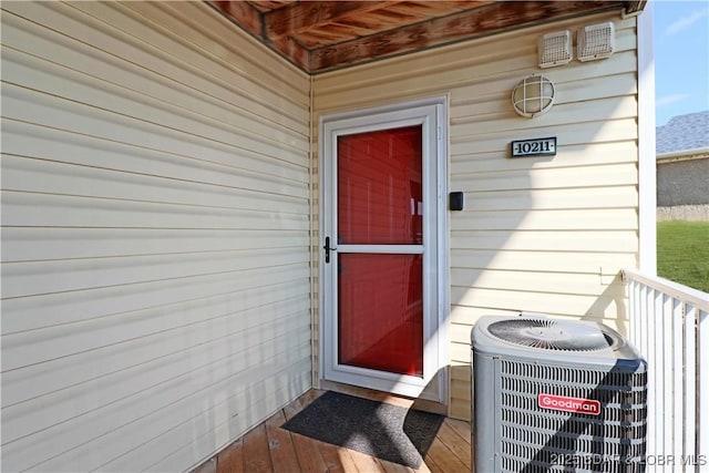 doorway to property with cooling unit