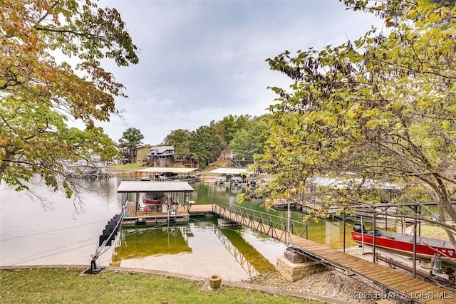 dock area featuring a water view