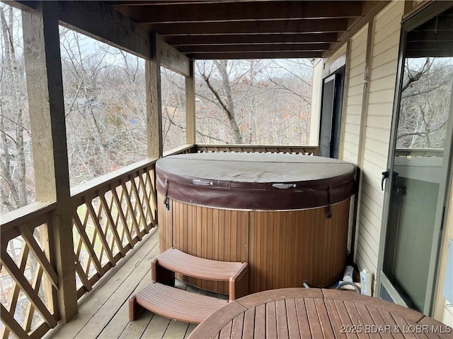 223 Waterscape Dr, Osage Beach, MO 65065 - wooden deck featuring a hot tub and outdoor dining space