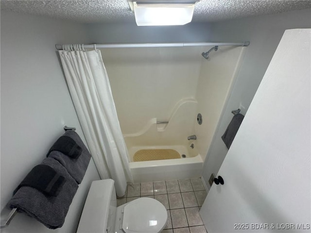 223 Waterscape Dr, Osage Beach, MO 65065 - full bath featuring shower / bathtub combination with curtain, tile patterned flooring, toilet, and a textured ceiling