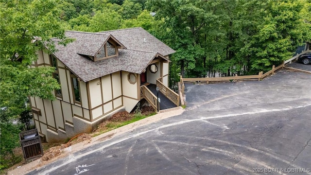 223 Waterscape Dr, Osage Beach, MO 65065 - exterior space with roof with shingles