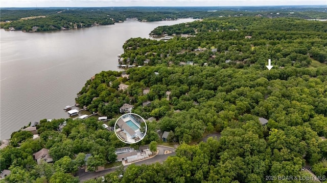 223 Waterscape Dr, Osage Beach, MO 65065 - aerial view of a nearby body of water and a forest